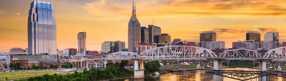 A photo of the Nashville skyline during the day.